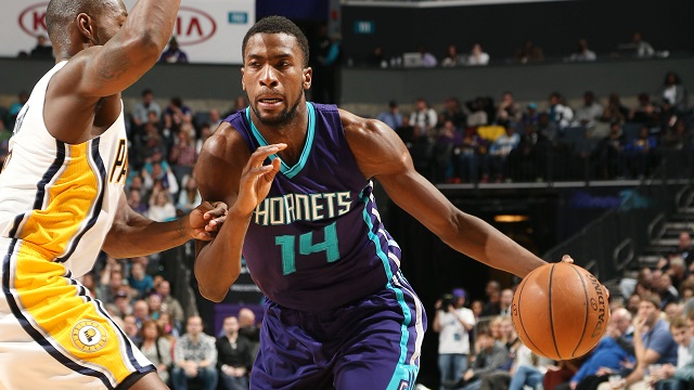 CHARLOTTE, NC - JANUARY 17: Michael Kidd-Gilchrist #14 of the Charlotte Hornets drives against the Indiana Pacers during the game at the Time Warner Cable Arena on January 17, 2015 in Charlotte, North Carolina. NOTE TO USER: User expressly acknowledges and agrees that, by downloading and or using this photograph, User is consenting to the terms and conditions of the Getty Images License Agreement. Mandatory Copyright Notice: Copyright 2015 NBAE (Photo by Kent Smith/NBAE via Getty Images)